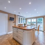 Spacious Aga kitchen with central island and casual dining area at The Poplars, 2 Cockpit Lane, Sandiway, Northwich.