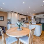 Aga kitchen and casual dining area with parquet flooring at The Poplars, 2 Cockpit Lane, Sandiway, Northwich.