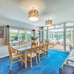 Separate dining room opening directly into the conservatory at 25 Hadrian Way, Sandiway.