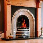 Contemporary living room fireplace with timber surround and inset gas fire creating a warm focal point.