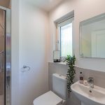 Modern en-suite shower room serving the second bedroom at 40 Hill Top Grange, Davenham, Northwich.