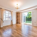 Reception room with french doors on to garden in Moulton, Northwich, Cheshire